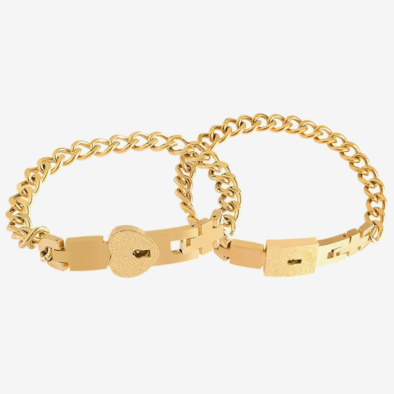 Paararmband mit herzförmigem Vorhängeschloss