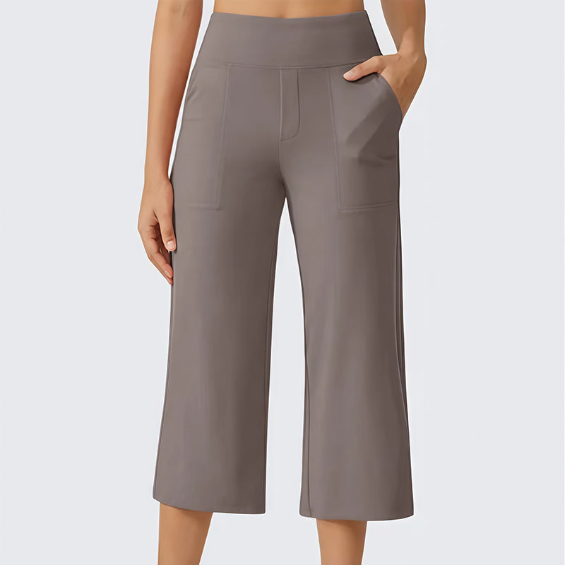 Damen-Hose mit hoher Taille, aus Stretchstoff und in verkürzter Länge